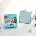 3D-Pop-up-Weihnachtskarte mit surfendem Weihnachtsmann auf blauem Ozean-Hintergrund - Surfender Weihnachtsmann