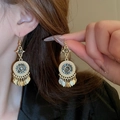 Close-up of bohemian gold tassel earrings with dark gemstones and pearl accents - 69# Black Waterdrop