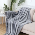 Deep gray flannel fleece blanket draped on a cozy beige sofa in a modern home setting - Silver Gray / 120x200cm