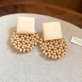 Close-up of bohemian earrings with cream resin squares and natural wooden beads - 19# 925 Sterling Silver Earring Post - White - Square Resin Wood Bead Hoop