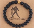 Wassermann Sternzeichen-Armband mit matten schwarzen Onyx- und Tigerauge-Perlen - Matt Schwarz + Wassermann + Bildstein