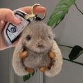 Cute gray plush rabbit keychain with leather limbs and a gold round carabiner clip - Grey Gold Ring