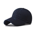 Close-up of 3D NEW YORK embroidery on a distressed dark blue cotton baseball cap - Adjustable / Navy Blue