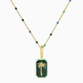 Close-up of gold palm tree pendant with malachite green texture and colorful beads - Green Palm Tree