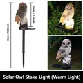 Lámpara solar búho de resina marrón con luz LED cálida y dimensiones de 42cm de altura - Marrón
