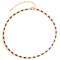 Detail of gold necklace featuring alternating black rectangular and clear round zircons - Black Necklace