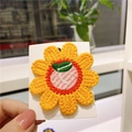 Handmade crochet sunflower hair clip with yellow petals and pink center on card - Yellow Flower With Peach
