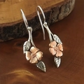 Vintage style floral long dangle earrings in silver and rose gold over wood texture - Gold and Silver Two-tone