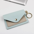 Portacarte sottile in pelle PU azzurra con slot beige e portachiavi dorato - Celeste