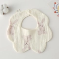 Close-up of soft gauze cotton baby bib featuring pink rabbit print and snap button - Gauze Flower Scarf - Long-eared Rabbit