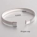 Dettaglio bracciale in filo d'acciaio inossidabile 6mm con larghezza 8mm e diametro 62mm - 8mm / Color Acciaio