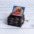 Hand-cranked wooden Halloween music box featuring colorful spooky castle and pumpkin prints - Hand-cranked Halloween K