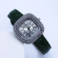 Detail of luxury square watch with diamond bezel, green leather strap and Roman numerals - Green Silver Case