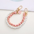 Double layered pearl and pink ribbon phone strap with camellia charm and gold clasps - Leather Woven Double Chain Strap / Pink