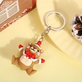Christmas bear keychain with red hat and bow tie, PVC material on cozy background - Bear (Silver Keychain)