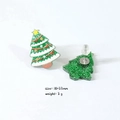 Detail of glitter green Christmas tree earrings with size 18x23mm and 2g weight specs - Christmas Tree