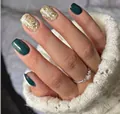 Close-up of short square green press-on nails with gold glitter finish on hand - Dark Green Gold Glitter Glue Style (Y-242)