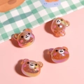 Macro shot of four orange transparent bear-shaped resin beads for DIY jewelry making - AB Color Bear (1 Piece)