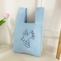 Light blue knit handbag featuring black bird motif and Fly like bird! text design - Light Blue Bird Bag