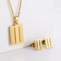 Macro detail of gold titanium steel jewelry set with Greek key hollow rectangle pattern - Check Pattern