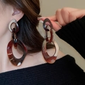Detail of tortoise shell resin chain earrings showing glossy brown link texture - Dark Coffee Amber Tortoise Three-ring Chain Earrings (16# Silver Pin)