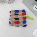 Detailed top view of plush storage bag with colorful pom-poms and green tassel - Square Style