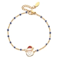 Dettaglio del ciondolo Babbo Natale con catena in acciaio inox dorato e perle blu - Blu