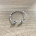 Silver open heart bangle featuring sparkling crystal pavé on a modern polished band - Heart (Silver)