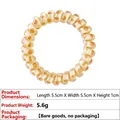 Detailed view of beige telephone cord hair tie with orange dots and 5.5cm size scale - 4# Yellow Spotted Spiral Hair Tie