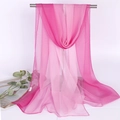 Detailed view of lightweight gradient pink chiffon scarf hanging on a metal rack display - Pink Rose Red Gradient