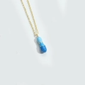 Golden necklace featuring a blue and light blue enamel balloon-shaped pendant charm - Letter I