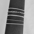 Set of five silver Bohemian minimalist metal bracelets featuring Figaro and snake chain styles - Style 3 Silver