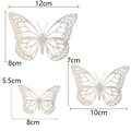Detailed view of 3D hollow butterfly wall decor in three sizes with laser-cut patterns - Silver Butterfly 12pcs Pack
