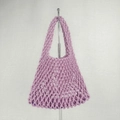 Detail showing the intricate purple cotton rope weave and mesh texture of this tote bag - Purple