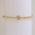 Minimalist 18k gold plated beaded bracelet featuring micro-paved letter E charm - Letter E