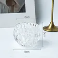 Spherical clear glass pumpkin tea light holder with honeycomb texture and 6cm opening - Large Double Arrow