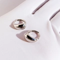 Minimalist silver water drop huggie hoop earrings with polished mirror finish - White Gold