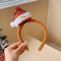 Close-up of brown plush Christmas headband with mini red Merry X-MAS hat decoration - 7# Christmas Headband (HN0123)
