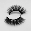 Detailed close-up of thick, fluffy black faux mink eyelashes with soft natural layers - D591N