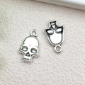 Antique silver skull charm for DIY jewelry making, front and back views of skull pendant - Skull Head 12x18mm