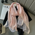 Pink silk-like shawl with elegant pearl embellishments and metallic trim detail - Pink