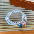 Detail of double-layer beaded bracelet with blue crystals and pink peace buckle charm - Double Loop Light Blue Safety Buckle Style (39#)