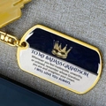 Golden crown dog tag keychain with badass grandson engraving on gray fabric - Grandson / Gold
