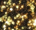 Detailed close-up of a royal blue sequin evening gown showing gold sequin fabric details - S (US 2) / Gold