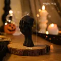 Handmade black skull candle with skeleton hand base for Halloween, 10cm height - Hand-holding Skull / Black