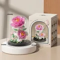 Pink and white building block flower in a clear dust cover with retail packaging - M3120 Multiflora Rose / 157pcs/Base+Dust Cover Model