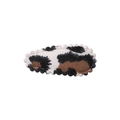 Handmade fabric snap hair clip featuring a black and white cow print pattern with wavy edges - Animal Print (45)
