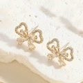 Detailed macro view of golden butterfly earrings featuring sparkling zircon stone inlay - ES2388-5 Gold Butterfly Pave Zircon Earrings