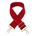 Detailed view of red geometric jacquard bag strap with gold lobster clasps and adjuster - Red