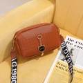 Brown woven texture crossbody shell bag with black cat pendant and wide letter strap - Brown